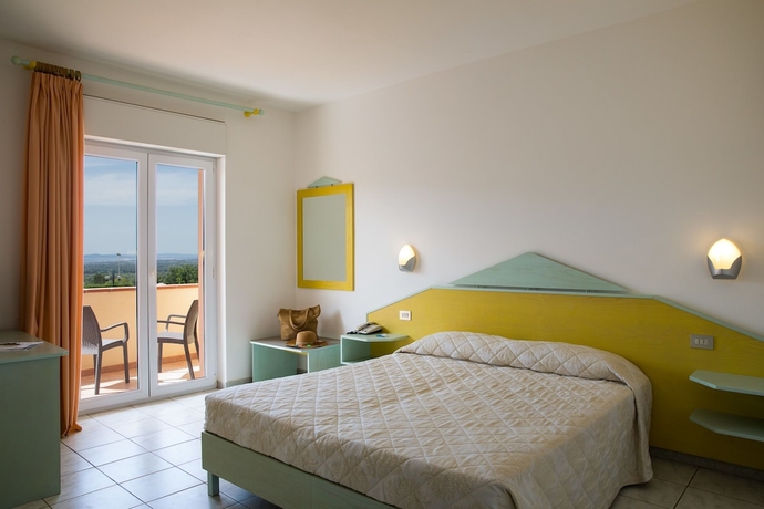 Imagen de la habitación del Hotel Lu'Hotel Porto Pino. Foto 4