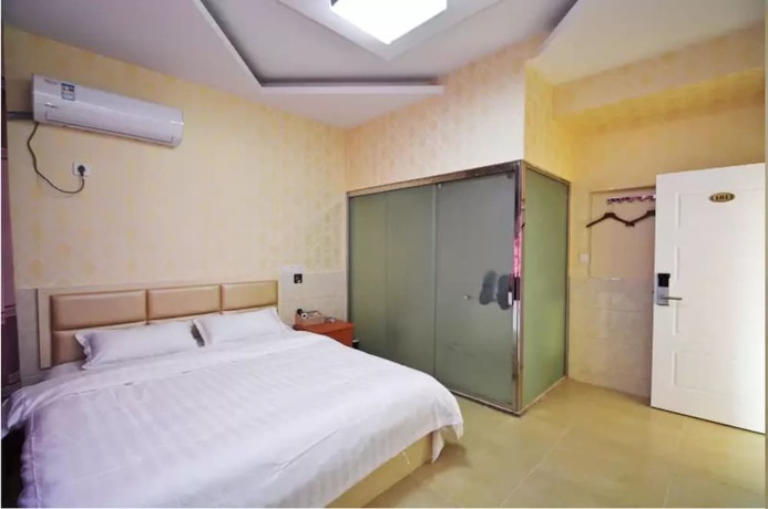 Imagen de la habitación del Hotel LuHuai. Foto 18