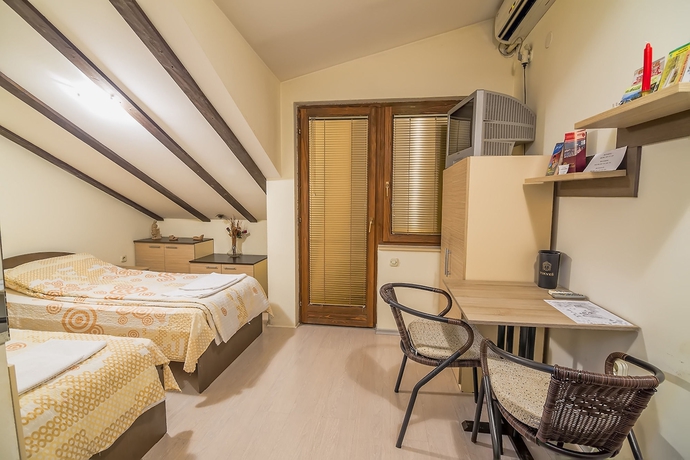 Imagen de la habitación del Hotel Luccia Apartments- Very Central Cozy Condo. Foto 11