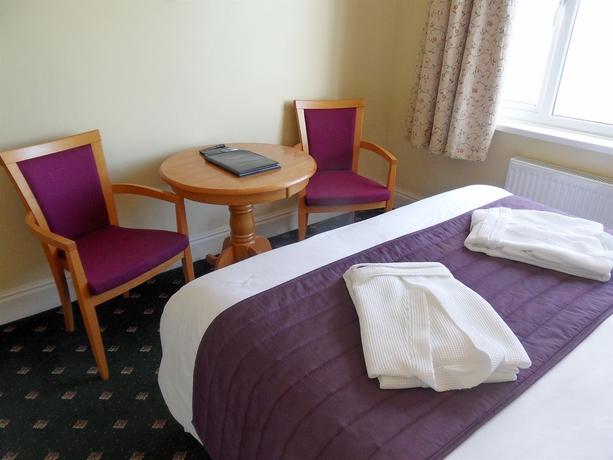 Imagen de la habitación del Hotel Luccombe Hall Country House. Foto 9