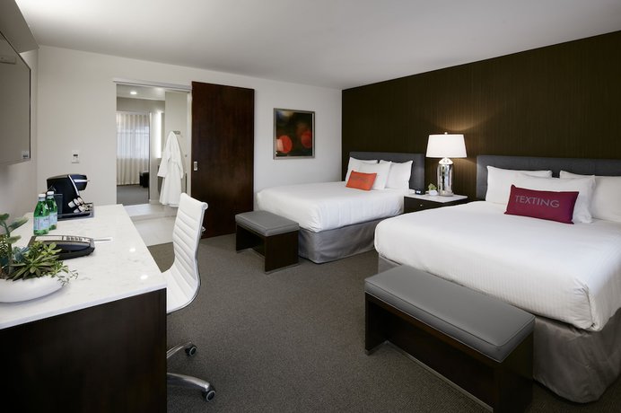 Imagen de la habitación del Hotel Lucent. Foto 15