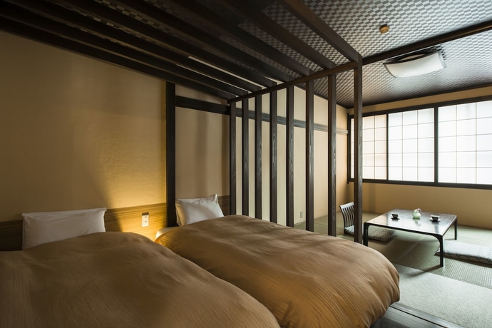 Imagen de la habitación del Hotel Lucent Takamiya. Foto 16