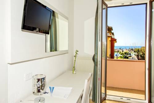 Imagen de la habitación del Hotel Lucerna, Castiglione della Pescaia. Foto 1