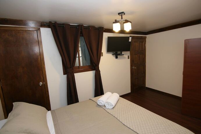 Imagen de la habitación del Hotel Lucia Agustina Boutique. Foto 11