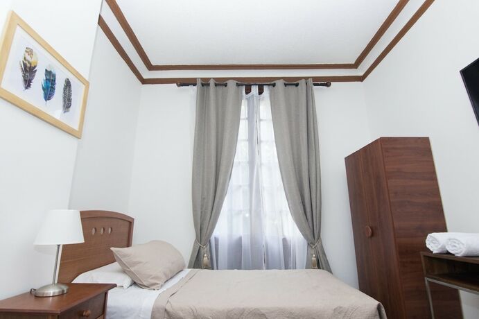 Imagen de la habitación del Hotel Lucia Agustina Boutique. Foto 22
