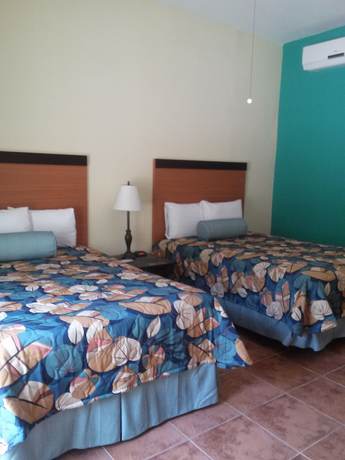 Imagen de la habitación del Hotel Lucia Beach. Foto 7