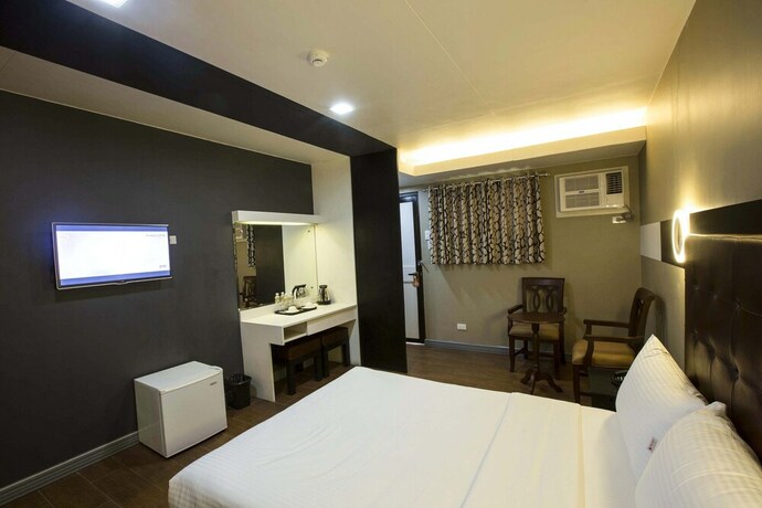 Imagen de la habitación del Hotel Lucky 9 Budget. Foto 21