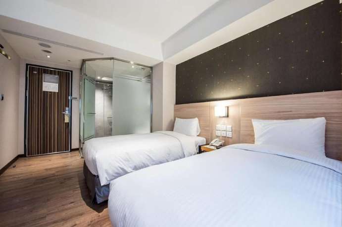 Imagen de la habitación del Hotel Lucky Apple. Foto 9
