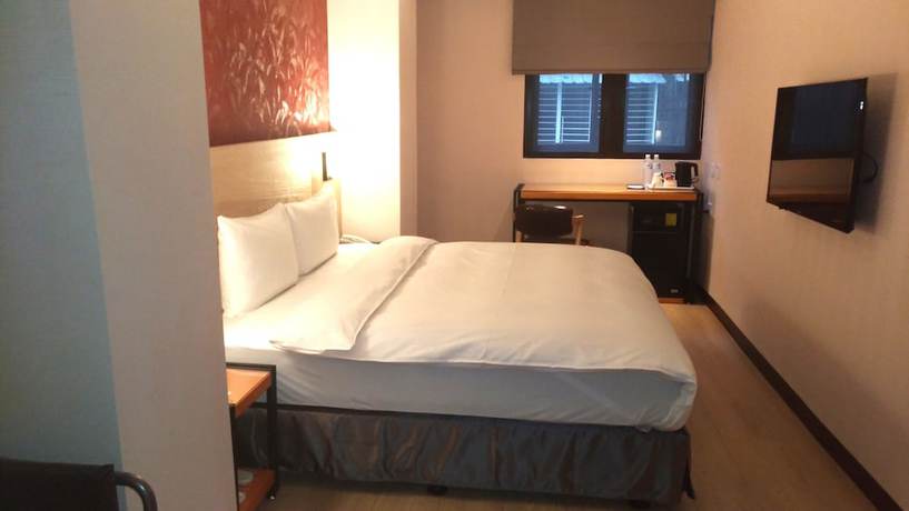 Imagen de la habitación del Hotel Lucky Apple. Foto 14