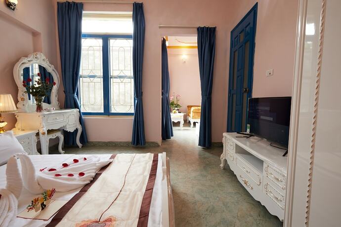 Imagen de la habitación del Hotel Lucky Budda Inn Villa. Foto 20