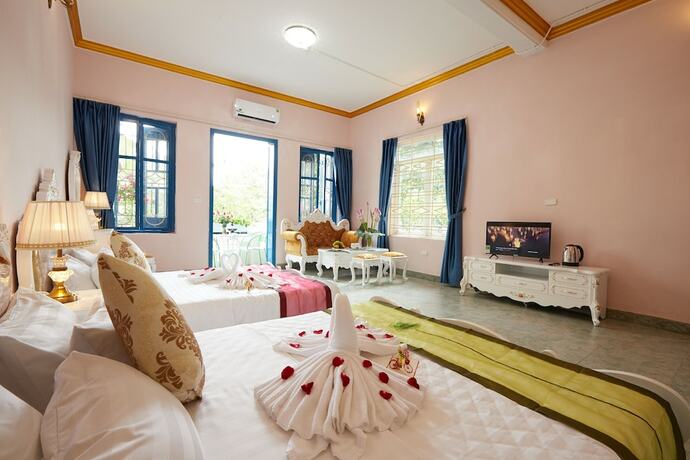 Imagen de la habitación del Hotel Lucky Budda Inn Villa. Foto 25