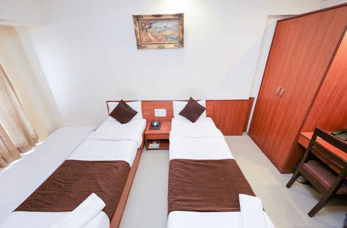 Imagen de la habitación del Hotel Lucky Goregaon. Foto 30