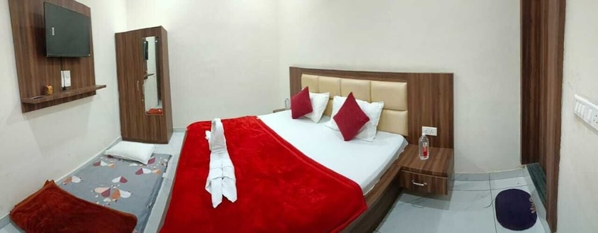 Imagen de la habitación del Hotel Lucky Guest House, Jhansi. Foto 6