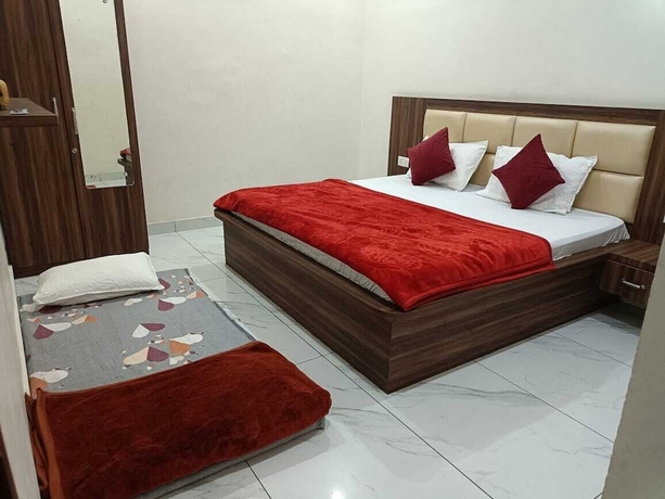Imagen de la habitación del Hotel Lucky Guest House, Jhansi. Foto 8