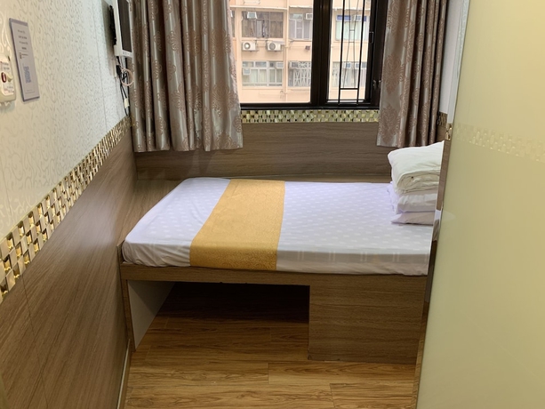 Imagen de la habitación del Hotel Lucky Guest House, Kowloon. Foto 4