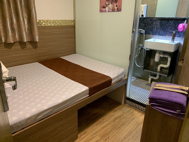 Imagen de la habitación del Hotel Lucky Guest House, Kowloon. Foto 10
