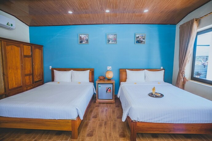 Imagen de la habitación del Hotel Lucky Homes. Foto 17