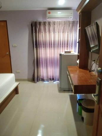 Imagen de la habitación del Hotel Lucky Inn Residency, PATTAYA BEACH. Foto 10
