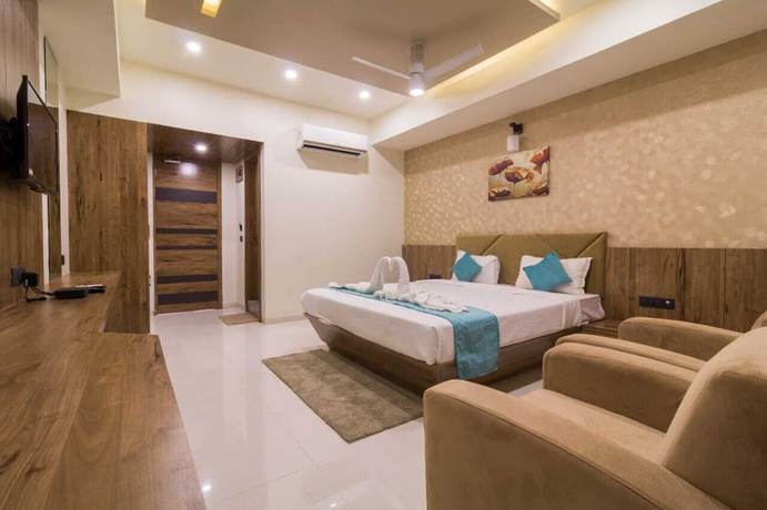 Imagen de la habitación del Hotel Lucky Inn Suites. Foto 4