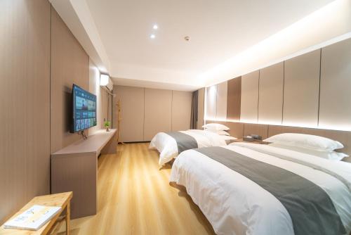 Imagen de la habitación del Hotel Lucky Praised Scenery. Foto 12