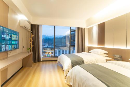 Imagen de la habitación del Hotel Lucky Praised Scenery. Foto 13