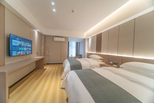 Imagen de la habitación del Hotel Lucky Praised Scenery. Foto 14