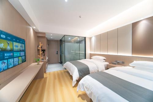 Imagen de la habitación del Hotel Lucky Praised Scenery. Foto 15