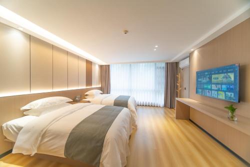 Imagen de la habitación del Hotel Lucky Praised Scenery. Foto 16
