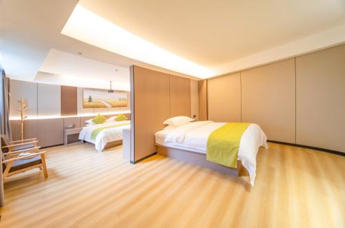 Imagen de la habitación del Hotel Lucky Praised Scenery. Foto 18