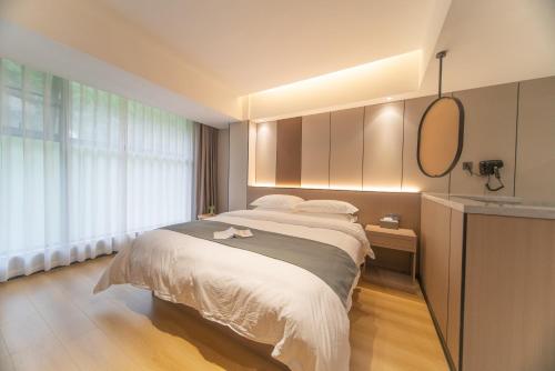 Imagen de la habitación del Hotel Lucky Praised Scenery. Foto 19