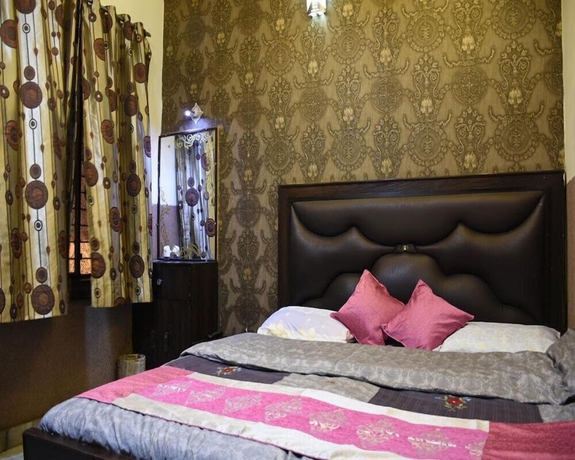 Imagen de la habitación del Hotel Lucky Restaurant And Guest House. Foto 4