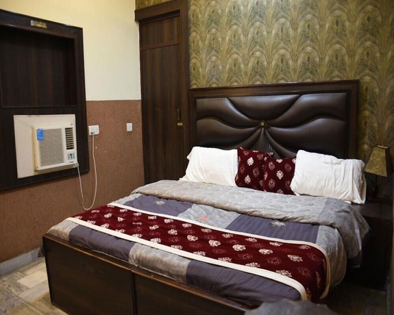 Imagen de la habitación del Hotel Lucky Restaurant And Guest House. Foto 5