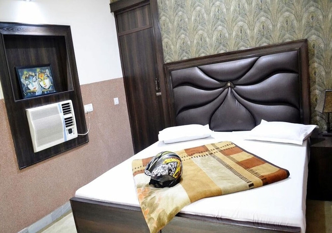 Imagen de la habitación del Hotel Lucky Restaurant And Guest House. Foto 8