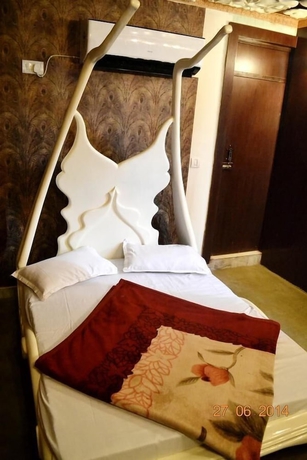 Imagen de la habitación del Hotel Lucky Restaurant And Guest House. Foto 10
