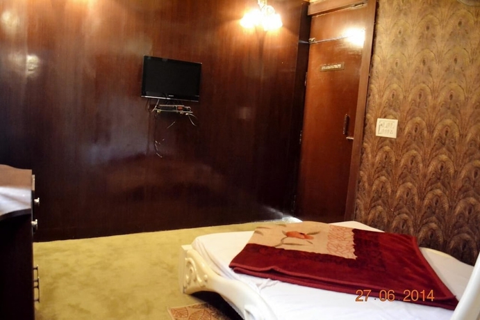 Imagen de la habitación del Hotel Lucky Restaurant And Guest House. Foto 13