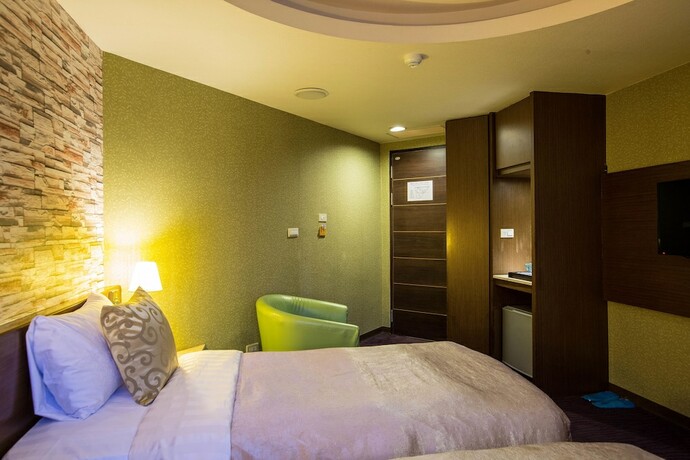 Imagen de la habitación del Hotel Luckynews Classic. Foto 17