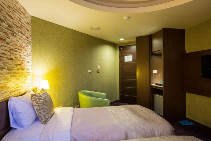 Imagen de la habitación del Hotel Luckynews Classic. Foto 18