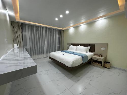 Imagen de la habitación del Hotel Luckytito Anilao Resort. Foto 15