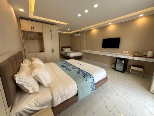 Imagen de la habitación del Hotel Luckytito Anilao Resort. Foto 16