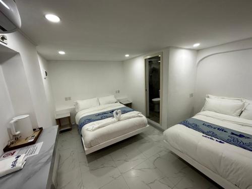 Imagen de la habitación del Hotel Luckytito Anilao Resort. Foto 18