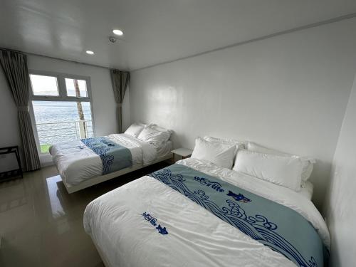 Imagen de la habitación del Hotel Luckytito Anilao Resort. Foto 19