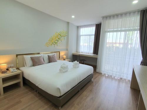 Imagen de la habitación del Hotel Lueangchan Orchid. Foto 16