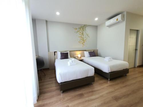 Imagen de la habitación del Hotel Lueangchan Orchid. Foto 17