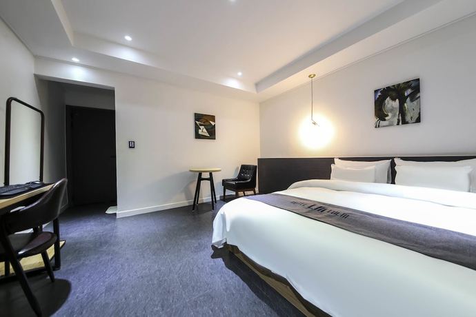 Imagen de la habitación del Hotel Luem. Foto 9