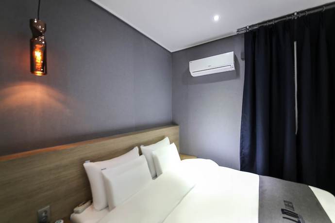 Imagen de la habitación del Hotel Luem. Foto 15