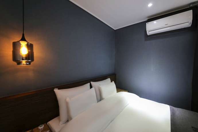 Imagen de la habitación del Hotel Luem. Foto 16