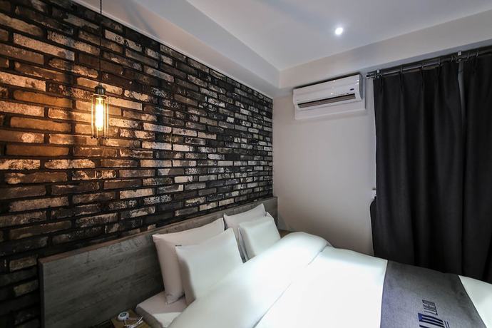 Imagen de la habitación del Hotel Luem. Foto 17