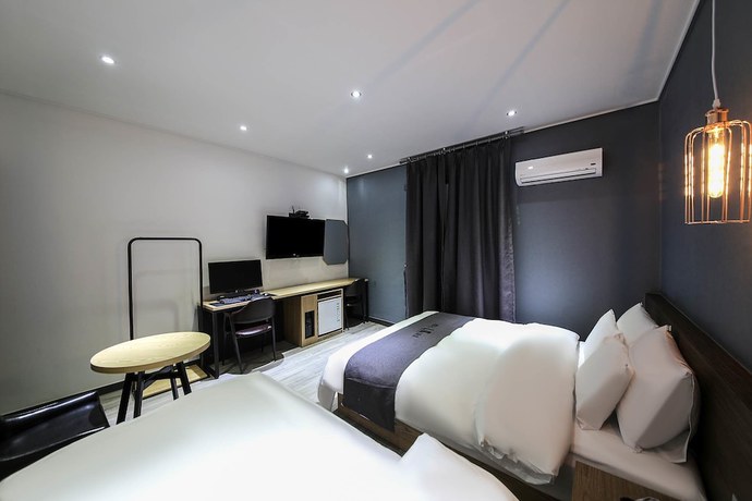 Imagen de la habitación del Hotel Luem. Foto 18