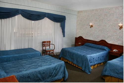 Imagen de la habitación del Hotel Luey. Foto 19