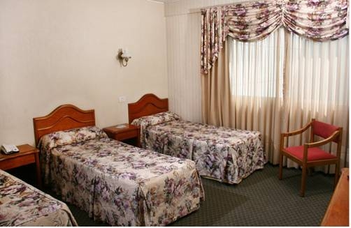 Imagen de la habitación del Hotel Luey. Foto 20